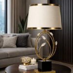Crystal Bloom gold table lamp styled in a modern living room interior