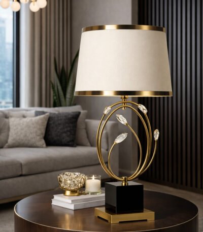 Crystal Bloom gold table lamp styled in a modern living room interior
